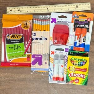 School supply bundle, pens, crayons, pencils, ruler, glue sticks.